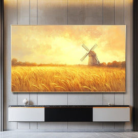 Tableau d'un champ de blé doré ondulant devant un vieux moulin à vent, ciel ocre et lumière chaude