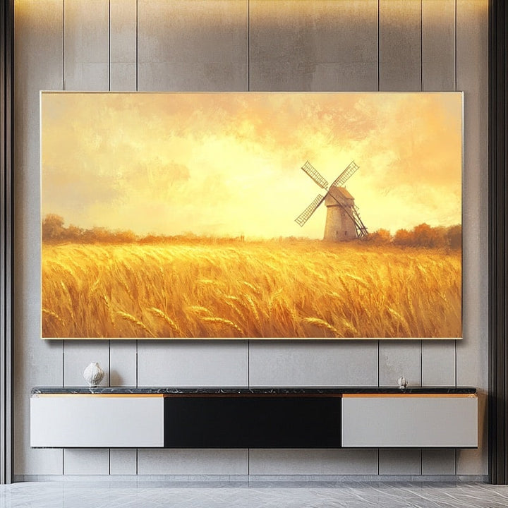 Tableau d'un champ de blé doré ondulant devant un vieux moulin à vent, ciel ocre et lumière chaude