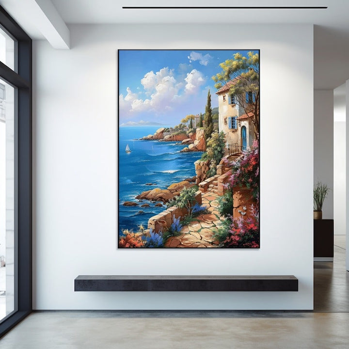 Tableau d'une côte provençale, maison aux volets bleus, escalier de pierre fleuri et mer bleue avec voilier