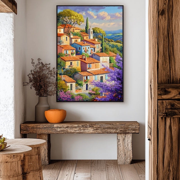 Tableau d'un village provençal perché aux toits de tuiles orangées, glycines violettes et cyprès